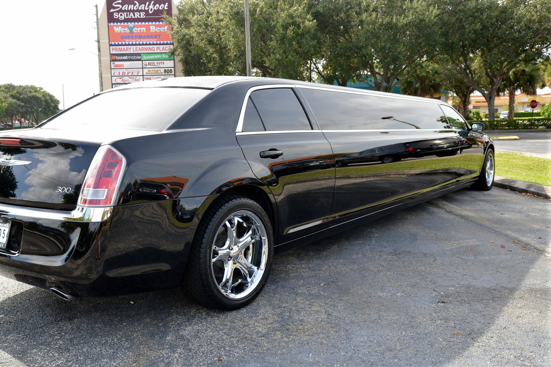 a Chrysler 300 black stretch limo ready to go out on the road