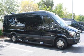 Picture of a black sprinter transit limo van 