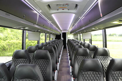 A 55-passenger bus charter interior photo